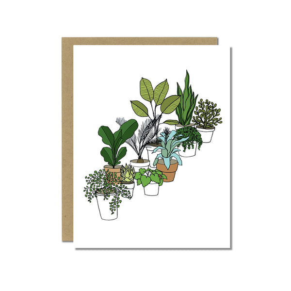 A greeting card showing a hand-drawn illustration of a collection of houseplants. Shown with a Kraft paper envelope on a white background.