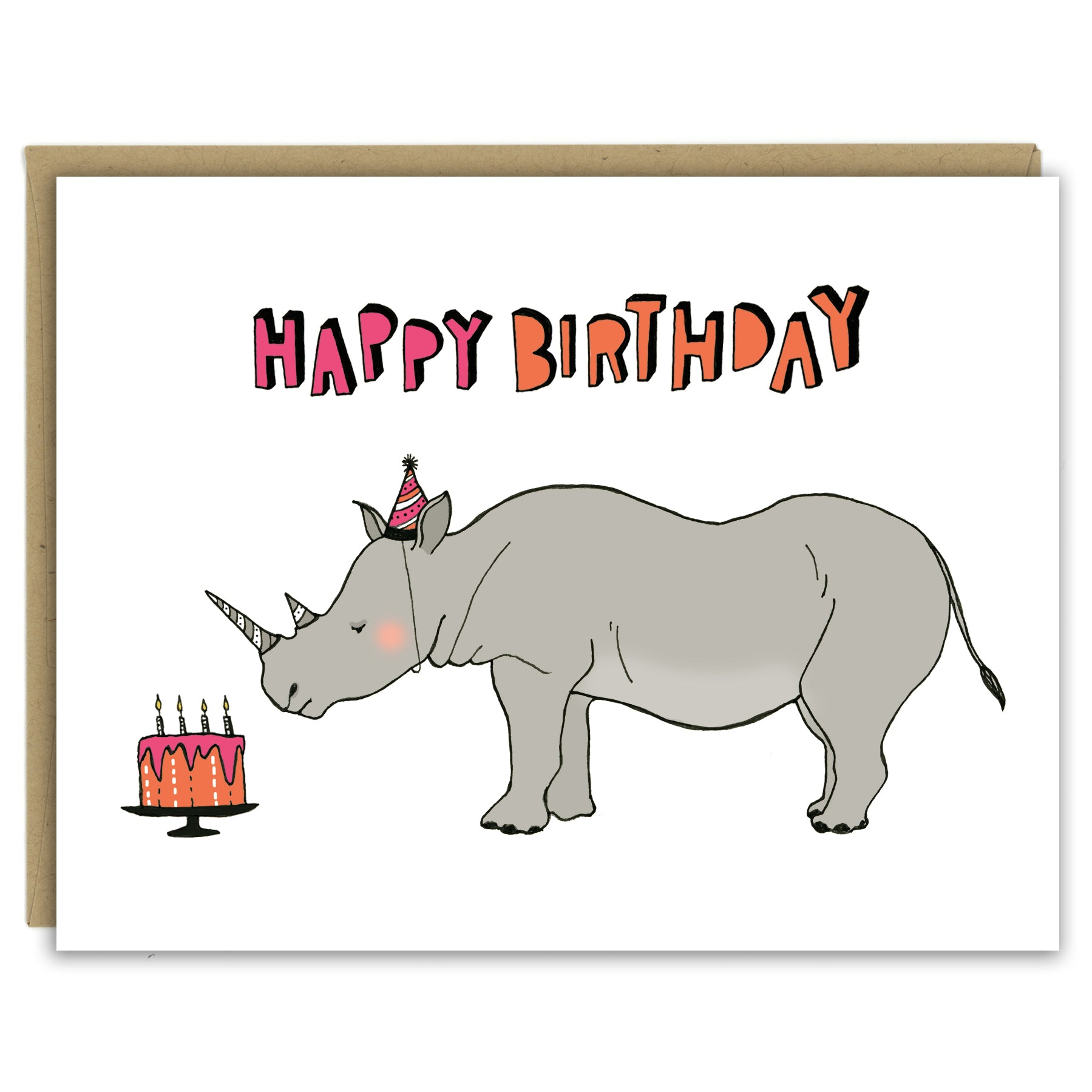 A greeting card showing a hand-drawn illustration of a rhinoceros wearing a pink and black striped party hat that matches stripes on his horns, looking at an orange and pink birthday cake. A hand-lettered message reads, "Happy Birthday." Shown with a Kraft paper envelope on a white background. 
