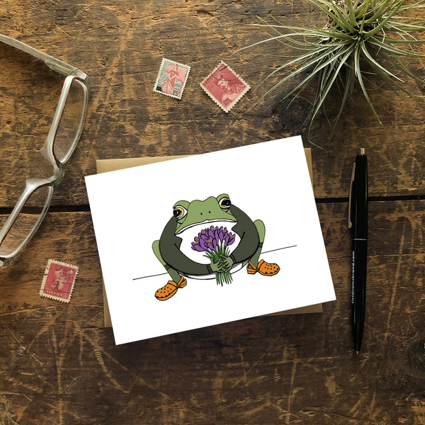 Croak-us! Toad with Crocuses Greeting Card